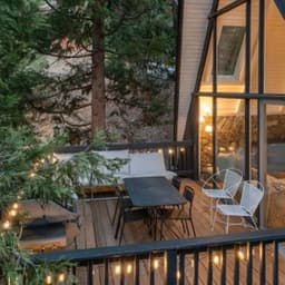 Mountain cabin decks among the pines near SkyPark